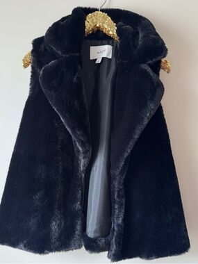 Black faux fur vest